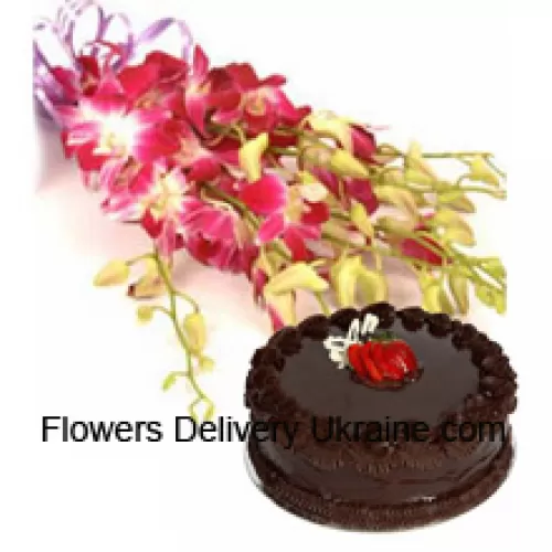 Bunch Of Pink Orchids With Seasonal Fillers Along With 1 Lb. (1/2 Kg) Chocolate Truffle Cake