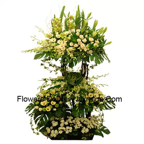 A Tall Arrangement Of Assorted White Flowers