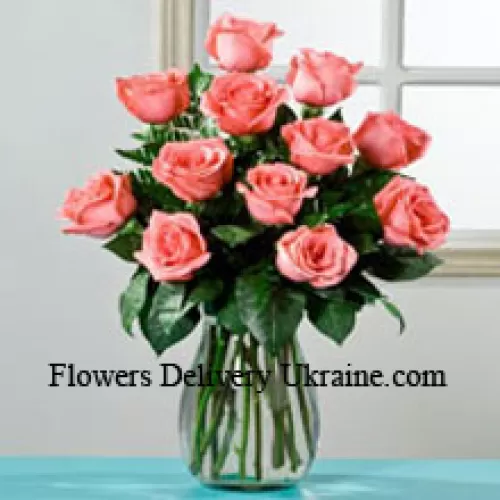 11 rosa Rosen in einer Vase