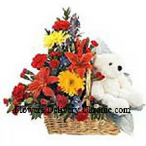 Basket Of Assorted Flowers With A Cute Teddy Bear
