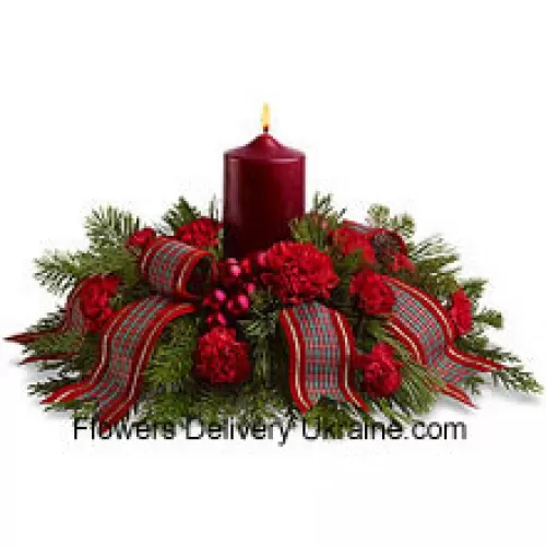 Celebrate a traditional family Christmas with this wonderful holiday centerpiece. Red carnations, fragrant evergreens and shiny ornament balls surround a red pillar candle, and a fancy ribbon adds a special touch! A lovely way to light the holiday table or a pretty sideboard decoration. (Please Note That We Reserve The Right To Substitute Any Product With A Suitable Product Of Equal Value In Case Of Non-Availability Of A Certain Product)